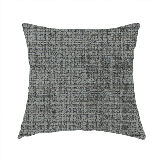 The fabric used to create these handmade cushions is a Scanno Weave upholstery fabric in a neutral grey shade, featuring a detailed, woven texture with an interlocking grid pattern.