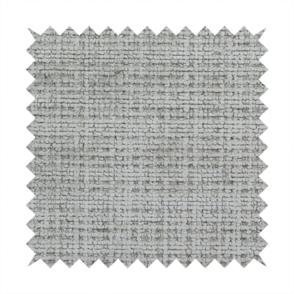 Scanno Weave upholstery fabric in a light grey shade, featuring a detailed, woven texture with an interlocking grid pattern.
