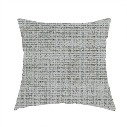 The fabric used to create these handmade cushions is a Scanno Weave upholstery fabric in a light grey shade, featuring a detailed, woven texture with an interlocking grid pattern.