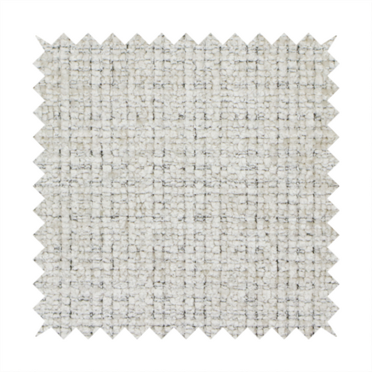 Scanno Weave upholstery fabric in a creamy off-white shade, featuring a detailed, woven texture with an interlocking grid pattern.
