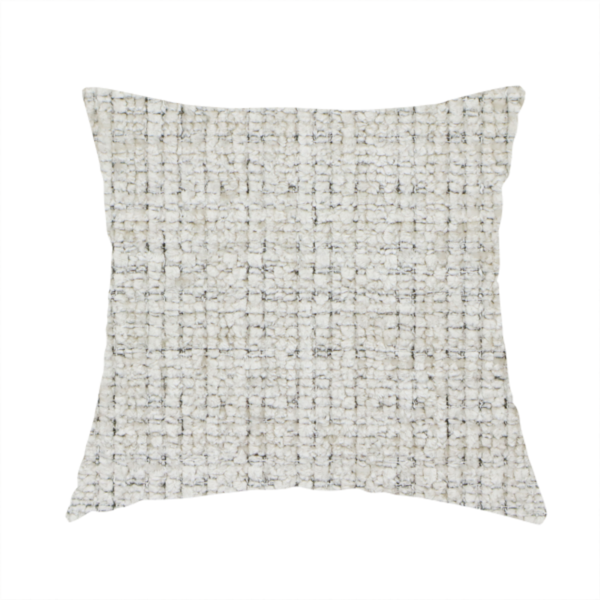 The fabric used to create these handmade cushions is a Scanno Weave upholstery fabric in a creamy off-white shade, featuring a detailed, woven texture with an interlocking grid pattern.