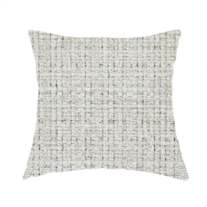 The fabric used to create these handmade cushions is a Scanno Weave upholstery fabric in a creamy off-white shade, featuring a detailed, woven texture with an interlocking grid pattern.