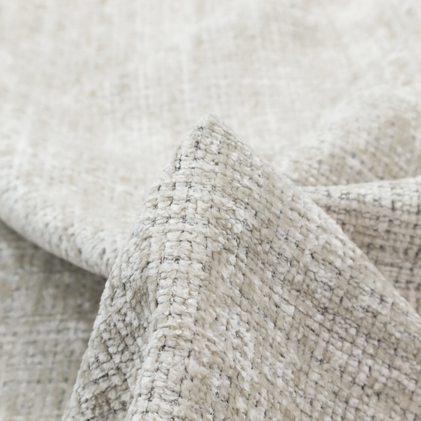 Scanno Weave upholstery fabric in a creamy off-white shade, featuring a detailed, woven texture with an interlocking grid pattern.