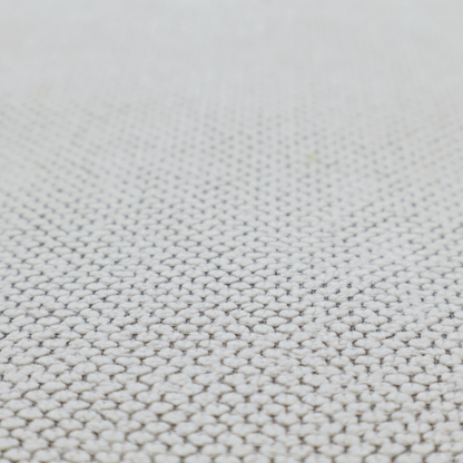 A waffle-knit or honeycomb-patterned weave characterized by a repeating, three-dimensional grid of soft, raised textures. Its off-white or light grey tone and uniform geometric structure suggest a cosy, high-quality material, commonly found in thermal apparel, heavy cotton blankets, or sophisticated upholstery. The dense, woven design provides a matte appearance with a subtle, visually rich depth.