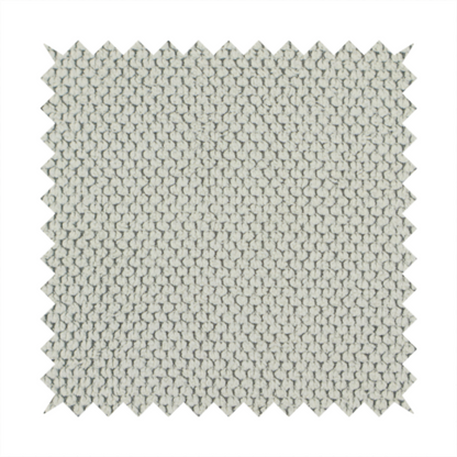 A waffle-knit or honeycomb-patterned weave, defined by a uniform, three-dimensional grid of raised, rounded textures. Its classic, versatile ivory hue and matte finish provide an elegant, cosy aesthetic. This structured, high-quality material is an excellent choice for luxury upholstery, decorative cushions, and premium home textiles that require a blend of durability and timeless style.