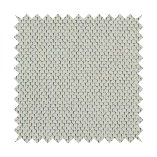 A waffle-knit or honeycomb-patterned weave, defined by a uniform, three-dimensional grid of raised, rounded textures. Its classic, versatile ivory hue and matte finish provide an elegant, cosy aesthetic. This structured, high-quality material is an excellent choice for luxury upholstery, decorative cushions, and premium home textiles that require a blend of durability and timeless style.