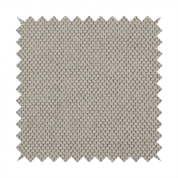 A waffle-knit or honeycomb-patterned weave, defined by a uniform, three-dimensional grid of raised, rounded textures. Its warm, versatile beige hue and matte finish provide an elegant, cosy aesthetic. This structured, high-quality material is an excellent choice for luxury upholstery, decorative cushions, and premium home textiles that require a blend of durability and timeless style.