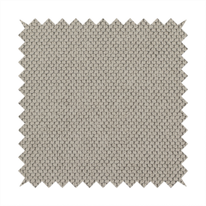 A waffle-knit or honeycomb-patterned weave, defined by a uniform, three-dimensional grid of raised, rounded textures. Its warm, versatile beige hue and matte finish provide an elegant, cosy aesthetic. This structured, high-quality material is an excellent choice for luxury upholstery, decorative cushions, and premium home textiles that require a blend of durability and timeless style.