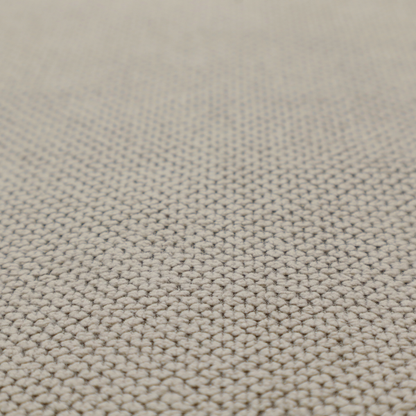 A waffle-knit or honeycomb-patterned weave, defined by a uniform, three-dimensional grid of raised, rounded textures. Its warm, versatile beige hue and matte finish provide an elegant, cosy aesthetic. This structured, high-quality material is an excellent choice for luxury upholstery, decorative cushions, and premium home textiles that require a blend of durability and timeless style.