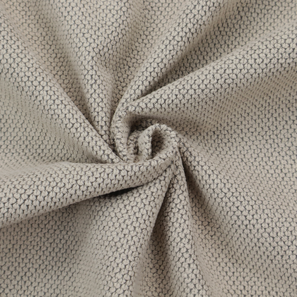 A waffle-knit or honeycomb-patterned weave, defined by a uniform, three-dimensional grid of raised, rounded textures. Its warm, versatile beige hue and matte finish provide an elegant, cosy aesthetic. This structured, high-quality material is an excellent choice for luxury upholstery, decorative cushions, and premium home textiles that require a blend of durability and timeless style.