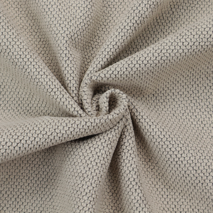 A waffle-knit or honeycomb-patterned weave, defined by a uniform, three-dimensional grid of raised, rounded textures. Its warm, versatile beige hue and matte finish provide an elegant, cosy aesthetic. This structured, high-quality material is an excellent choice for luxury upholstery, decorative cushions, and premium home textiles that require a blend of durability and timeless style.