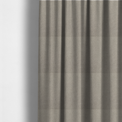 The fabric used to create these made-to-measure curtains is a waffle-knit or honeycomb-patterned weave, defined by a uniform, three-dimensional grid of raised, rounded textures. Its warm, versatile beige hue and matte finish provide an elegant, cosy aesthetic. This structured, high-quality material is an excellent choice for luxury upholstery, decorative cushions, and premium home textiles that require a blend of durability and timeless style.