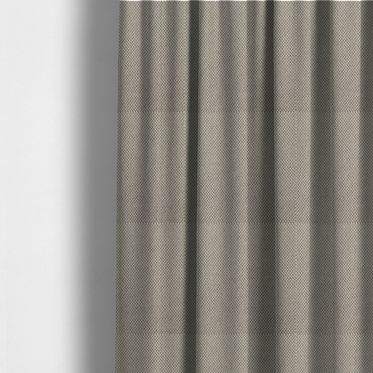 The fabric used to create these made-to-measure curtains is a waffle-knit or honeycomb-patterned weave, defined by a uniform, three-dimensional grid of raised, rounded textures. Its warm, versatile beige hue and matte finish provide an elegant, cosy aesthetic. This structured, high-quality material is an excellent choice for luxury upholstery, decorative cushions, and premium home textiles that require a blend of durability and timeless style.
