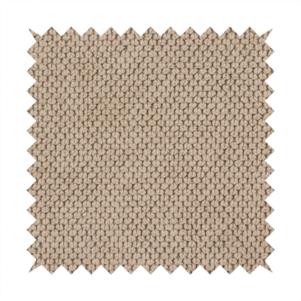 A waffle-knit or honeycomb-patterned weave, defined by a uniform, three-dimensional grid of raised, rounded textures. Its warm, inviting tan or light brown hue and matte finish provide an elegant, cosy aesthetic. This structured, high-quality material is an excellent choice for luxury upholstery, decorative cushions, and premium home textiles that require a blend of durability and timeless style.