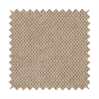 A waffle-knit or honeycomb-patterned weave, defined by a uniform, three-dimensional grid of raised, rounded textures. Its warm, inviting tan or light brown hue and matte finish provide an elegant, cosy aesthetic. This structured, high-quality material is an excellent choice for luxury upholstery, decorative cushions, and premium home textiles that require a blend of durability and timeless style.