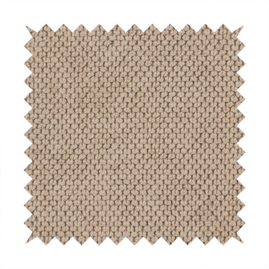 A waffle-knit or honeycomb-patterned weave, defined by a uniform, three-dimensional grid of raised, rounded textures. Its warm, inviting tan or light brown hue and matte finish provide an elegant, cosy aesthetic. This structured, high-quality material is an excellent choice for luxury upholstery, decorative cushions, and premium home textiles that require a blend of durability and timeless style.