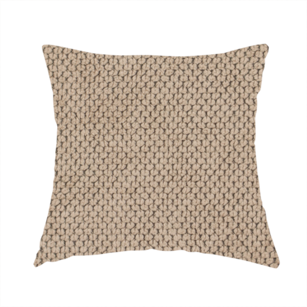 The fabric used to create these handmade cushions is a waffle-knit or honeycomb-patterned weave, defined by a uniform, three-dimensional grid of raised, rounded textures. Its warm, inviting tan or light brown hue and matte finish provide an elegant, cosy aesthetic. This structured, high-quality material is an excellent choice for luxury upholstery, decorative cushions, and premium home textiles that require a blend of durability and timeless style.