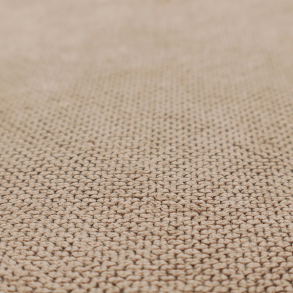 A waffle-knit or honeycomb-patterned weave, defined by a uniform, three-dimensional grid of raised, rounded textures. Its warm, inviting tan or light brown hue and matte finish provide an elegant, cosy aesthetic. This structured, high-quality material is an excellent choice for luxury upholstery, decorative cushions, and premium home textiles that require a blend of durability and timeless style.