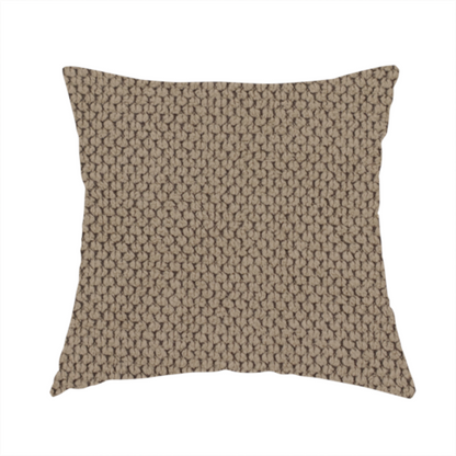 The fabric used to create these handmade cushions is a waffle-knit or honeycomb-patterned weave, defined by a uniform, three-dimensional grid of raised, rounded textures. Its rich, earthy taupe or warm brown hue and matte finish provide an elegant, cosy aesthetic. This structured, high-quality material is an excellent choice for luxury upholstery, decorative cushions, and premium home textiles that require a blend of durability and timeless style.