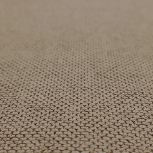 A waffle-knit or honeycomb-patterned weave, defined by a uniform, three-dimensional grid of raised, rounded textures. Its rich, earthy taupe or warm brown hue and matte finish provide an elegant, cosy aesthetic. This structured, high-quality material is an excellent choice for luxury upholstery, decorative cushions, and premium home textiles that require a blend of durability and timeless style.
