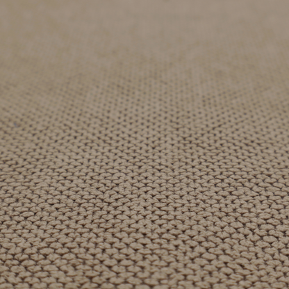 A waffle-knit or honeycomb-patterned weave, defined by a uniform, three-dimensional grid of raised, rounded textures. Its rich, earthy taupe or warm brown hue and matte finish provide an elegant, cosy aesthetic. This structured, high-quality material is an excellent choice for luxury upholstery, decorative cushions, and premium home textiles that require a blend of durability and timeless style.