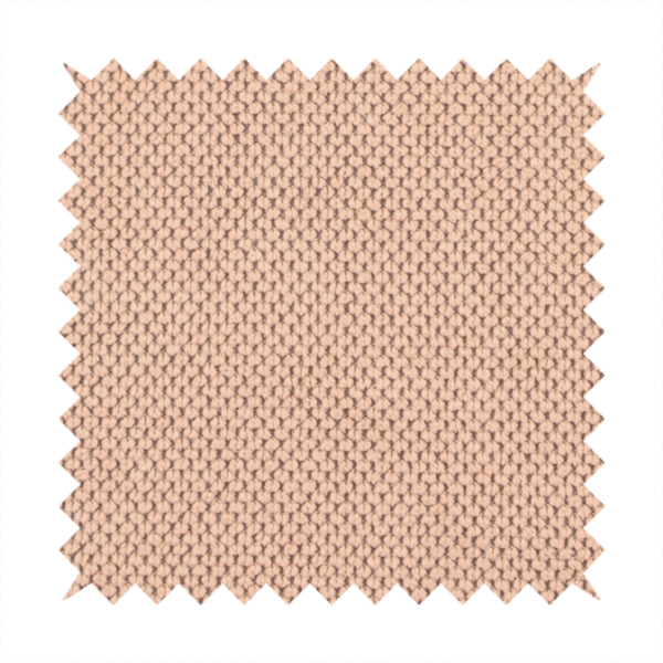A waffle-knit or honeycomb-patterned weave, defined by a uniform, three-dimensional grid of raised, rounded textures. Its soft, warm peach or dusty rose hue and matte finish provide an elegant, cosy aesthetic. This structured, high-quality material is an excellent choice for luxury upholstery, decorative cushions, and premium home textiles that require a blend of durability and timeless style.