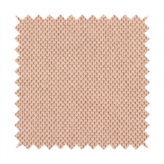 A waffle-knit or honeycomb-patterned weave, defined by a uniform, three-dimensional grid of raised, rounded textures. Its soft, warm peach or dusty rose hue and matte finish provide an elegant, cosy aesthetic. This structured, high-quality material is an excellent choice for luxury upholstery, decorative cushions, and premium home textiles that require a blend of durability and timeless style.