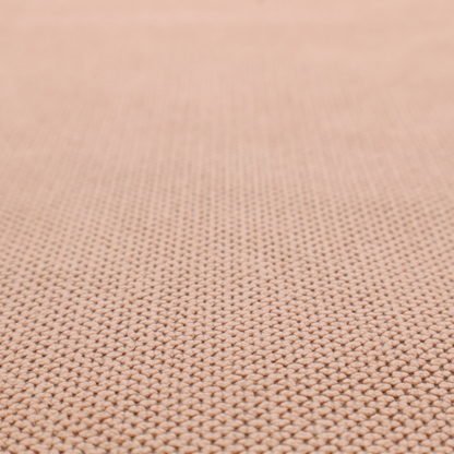A waffle-knit or honeycomb-patterned weave, defined by a uniform, three-dimensional grid of raised, rounded textures. Its soft, warm peach or dusty rose hue and matte finish provide an elegant, cosy aesthetic. This structured, high-quality material is an excellent choice for luxury upholstery, decorative cushions, and premium home textiles that require a blend of durability and timeless style.