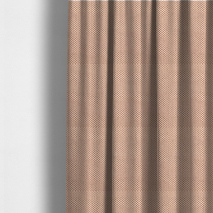 The fabric used to create these made-to-measure curtains is a waffle-knit or honeycomb-patterned weave, defined by a uniform, three-dimensional grid of raised, rounded textures. Its soft, warm peach or dusty rose hue and matte finish provide an elegant, cosy aesthetic. This structured, high-quality material is an excellent choice for luxury upholstery, decorative cushions, and premium home textiles that require a blend of durability and timeless style.