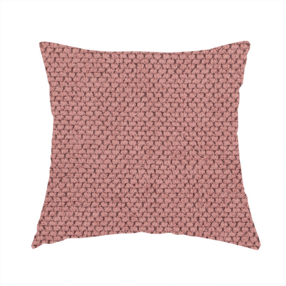 The fabric used to create these handmade cushions is a waffle-knit or honeycomb-patterned weave, defined by a uniform, three-dimensional grid of raised, rounded textures. Its rich, warm dusty rose or muted mauve hue and matte finish provide an elegant, cosy aesthetic. This structured, high-quality material is an excellent choice for luxury upholstery, decorative cushions, and premium home textiles that require a blend of durability and timeless style.