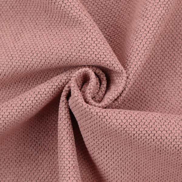 A waffle-knit or honeycomb-patterned weave, defined by a uniform, three-dimensional grid of raised, rounded textures. Its rich, warm dusty rose or muted mauve hue and matte finish provide an elegant, cosy aesthetic. This structured, high-quality material is an excellent choice for luxury upholstery, decorative cushions, and premium home textiles that require a blend of durability and timeless style.