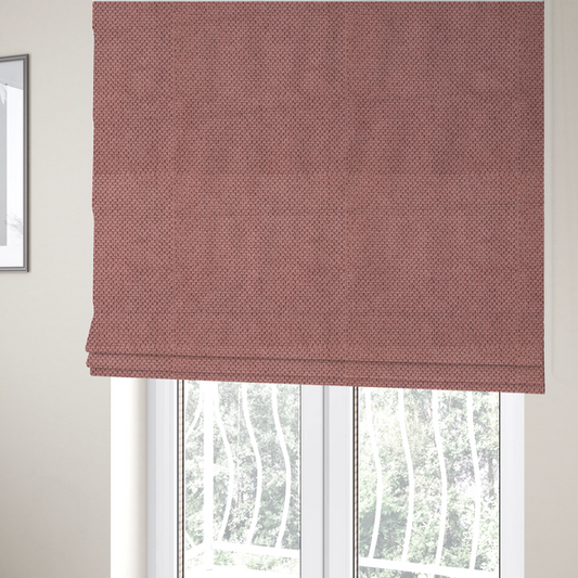 The fabric used to create these Roman blinds is a waffle-knit or honeycomb-patterned weave, defined by a uniform, three-dimensional grid of raised, rounded textures. Its rich, warm dusty rose or muted mauve hue and matte finish provide an elegant, cosy aesthetic. This structured, high-quality material is an excellent choice for luxury upholstery, decorative cushions, and premium home textiles that require a blend of durability and timeless style.