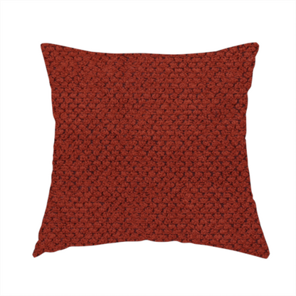 The fabric used to create these handmade cushions is a waffle-knit or honeycomb-patterned weave, defined by a uniform, three-dimensional grid of raised, rounded textures. Its bold, warm terracotta or rust hue and matte finish provide a striking, cosy aesthetic. This structured, high-quality material is an excellent choice for statement upholstery, decorative accent cushions, or premium home textiles that require a blend of durability and timeless, earthy style.