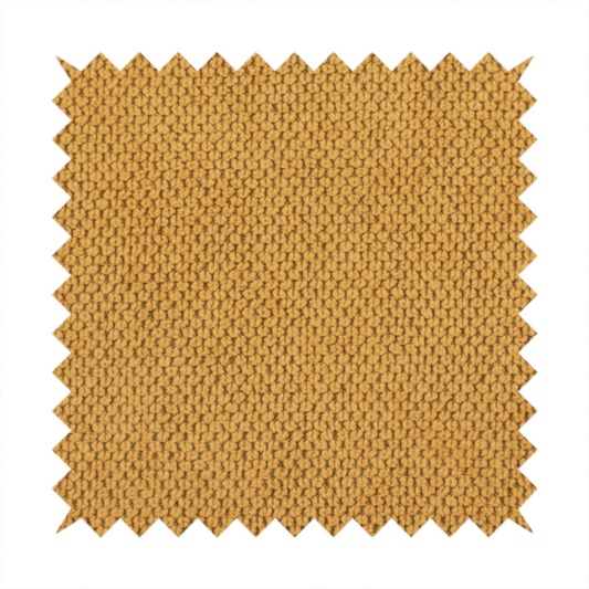 A waffle-knit or honeycomb-patterned weave of the collection, defined by its uniform, three-dimensional grid of raised, rounded textures. Its warm, vibrant mustard yellow or golden ochre hue, paired with a matte finish, provides a rich, inviting aesthetic. This structured, high-quality material is an excellent choice for statement upholstery, decorative accent cushions, or premium home textiles that require a blend of durability and timeless, cheerful style.