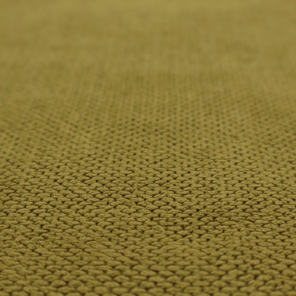 A waffle-knit or honeycomb-patterned weave of the collection, characterized by a uniform, three-dimensional grid of raised, rounded textures. Its rich, organic olive green or mossy tone with a matte finish offers a sophisticated, earthy aesthetic. This structured, high-quality material is an excellent choice for creating grounded, nature-inspired upholstery, decorative cushions, or premium home textiles that blend durability with a timeless, tranquil style.