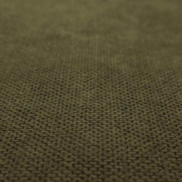A waffle-knit or honeycomb-patterned weave of the collection, defined by its uniform, three-dimensional grid of raised, rounded textures. Its deep, rich forest green or dark olive hue and matte finish provide a sophisticated, moody, and grounded aesthetic. This structured, high-quality material is an excellent choice for statement-making upholstery, plush decorative cushions, or premium home textiles that require a blend of durability, luxurious depth, and a timeless, nature-inspired style.