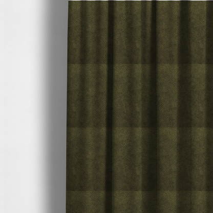 The fabric used to create these made-to-measure curtains is a waffle-knit or honeycomb-patterned weave of the collection, defined by its uniform, three-dimensional grid of raised, rounded textures. Its deep, rich forest green or dark olive hue and matte finish provide a sophisticated, moody, and grounded aesthetic. 