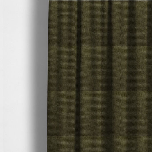 The fabric used to create these made-to-measure curtains is a waffle-knit or honeycomb-patterned weave of the collection, defined by its uniform, three-dimensional grid of raised, rounded textures. Its deep, rich forest green or dark olive hue and matte finish provide a sophisticated, moody, and grounded aesthetic. 