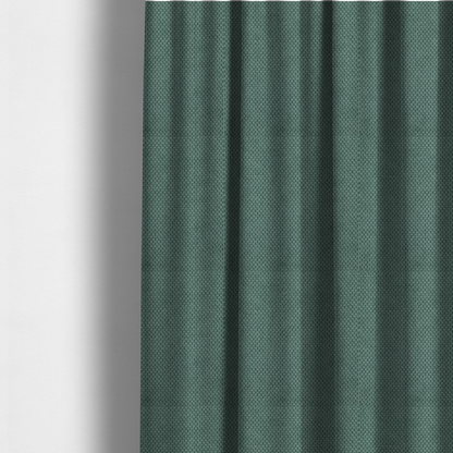 The fabric used to create these made-to-measure curtains is a premium teal or seafoam green fabric with a structured, three-dimensional waffle-knit or honeycomb texture for elegant interior design.