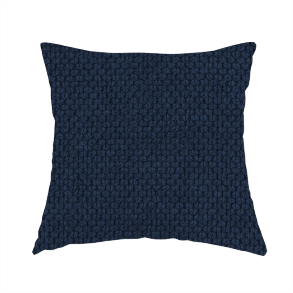 The fabric used to create these handmade cushions is a premium deep navy blue waffle-knit fabric, highlighting a dense, three-dimensional honeycomb weave for luxury upholstery.