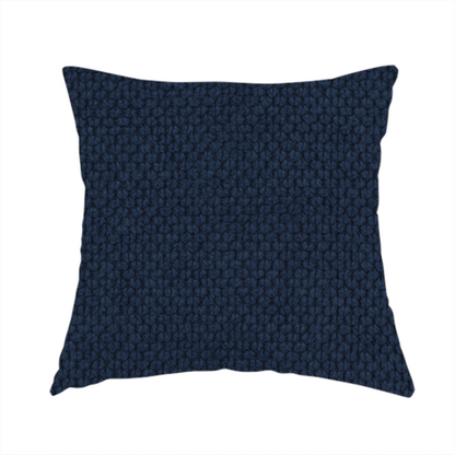 The fabric used to create these handmade cushions is a premium deep navy blue waffle-knit fabric, highlighting a dense, three-dimensional honeycomb weave for luxury upholstery.