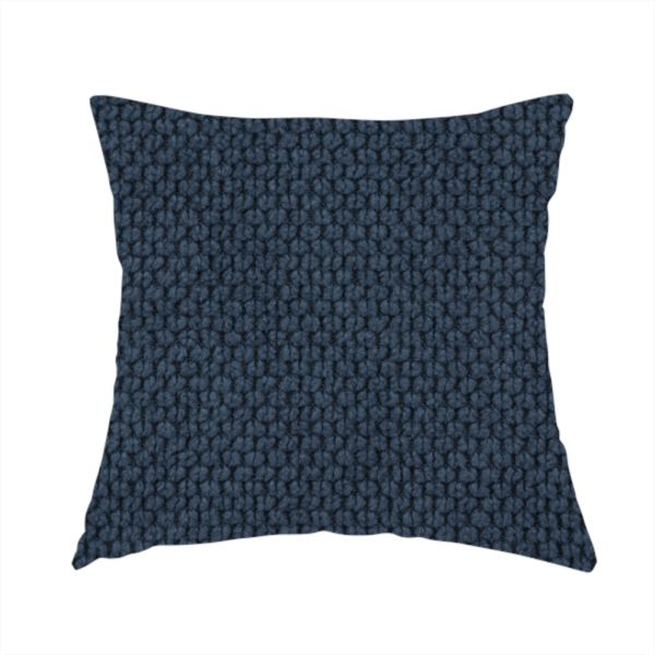The fabric used to create these handmade cushions is a premium navy blue waffle-knit fabric, highlighting a dense, three-dimensional honeycomb weave for luxury home decor.