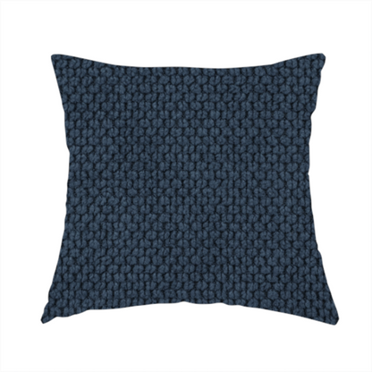 The fabric used to create these handmade cushions is a premium navy blue waffle-knit fabric, highlighting a dense, three-dimensional honeycomb weave for luxury home decor.