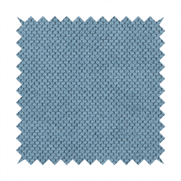 A premium light blue waffle-knit fabric, featuring a crisp, textured honeycomb weave ideal for contemporary home upholstery.