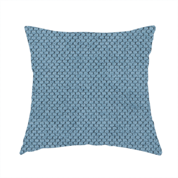 The fabric used to create this handmade cushion is a premium light blue waffle-knit fabric, featuring a crisp, textured honeycomb weave ideal for contemporary home upholstery.