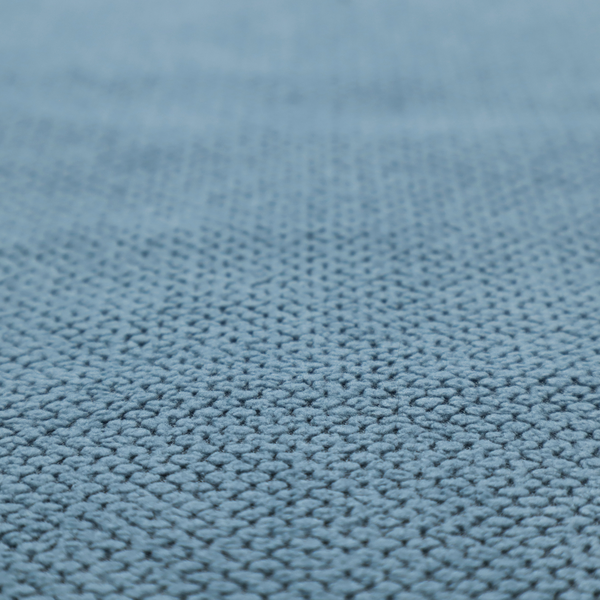A premium light blue waffle-knit fabric, featuring a crisp, textured honeycomb weave ideal for contemporary home upholstery.