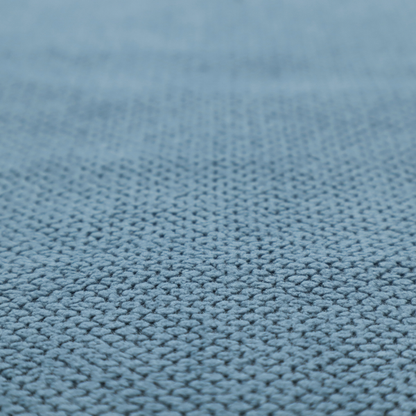 A premium light blue waffle-knit fabric, featuring a crisp, textured honeycomb weave ideal for contemporary home upholstery.