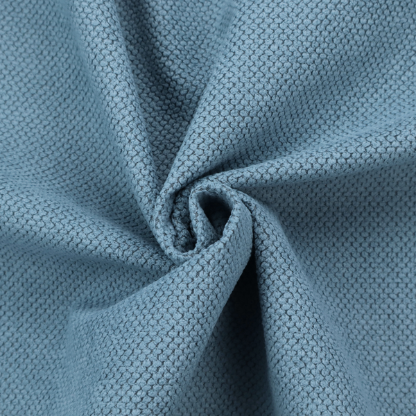 A premium light blue waffle-knit fabric, featuring a crisp, textured honeycomb weave ideal for contemporary home upholstery.