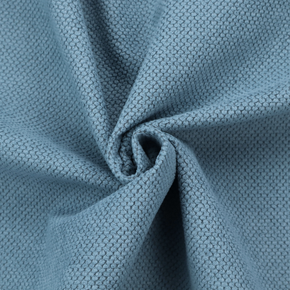 A premium light blue waffle-knit fabric, featuring a crisp, textured honeycomb weave ideal for contemporary home upholstery.