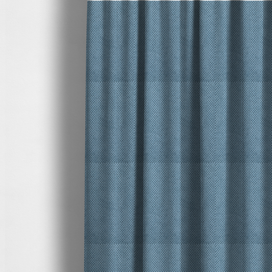 The fabric used to create these made-to-measure curtains is a premium light blue waffle-knit fabric, featuring a crisp, textured honeycomb weave ideal for contemporary home upholstery.